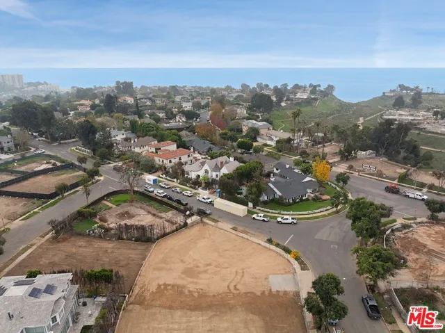 an aerial view of residential house with outdoor space