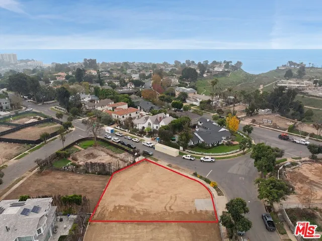 an aerial view of residential house with outdoor space