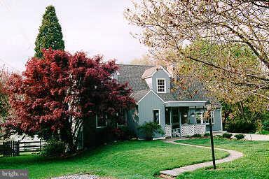 111 Heil Road Silver Spring, MD 20905 - Photo 2 of 4 a front view of house with yard and green space
