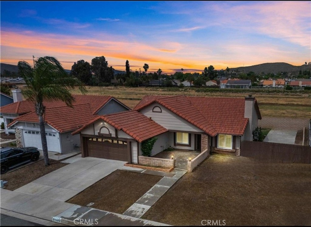 27126 Rio Vista Drive Menifee, CA 92586 - Photo 1 of 47 a view of house with outdoor space and seating area