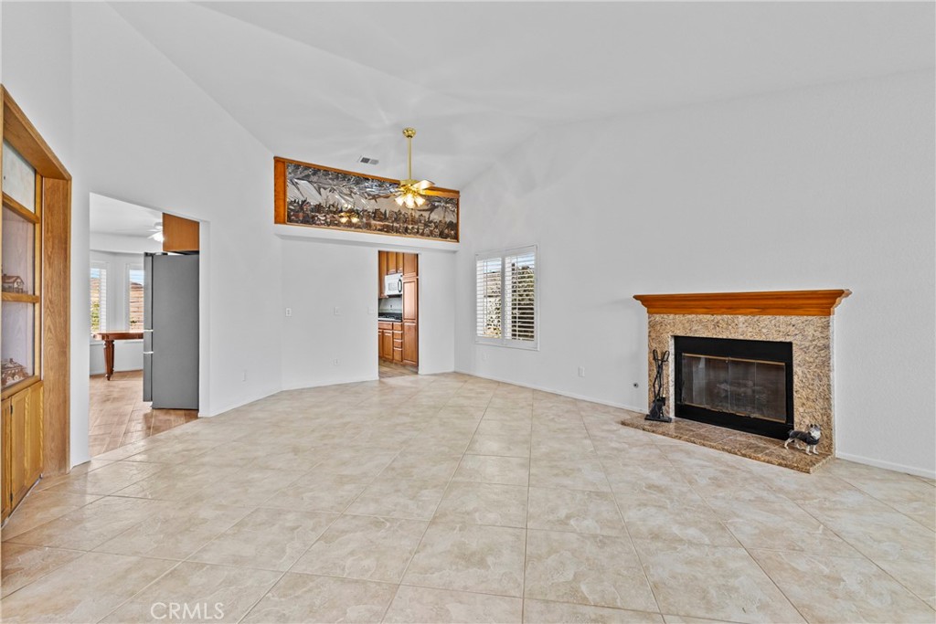 27126 Rio Vista Drive Menifee, CA 92586 - Photo 11 of 47 a view of a livingroom with a fireplace