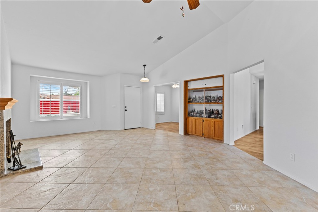27126 Rio Vista Drive Menifee, CA 92586 - Photo 15 of 47 a view of an empty room with a window