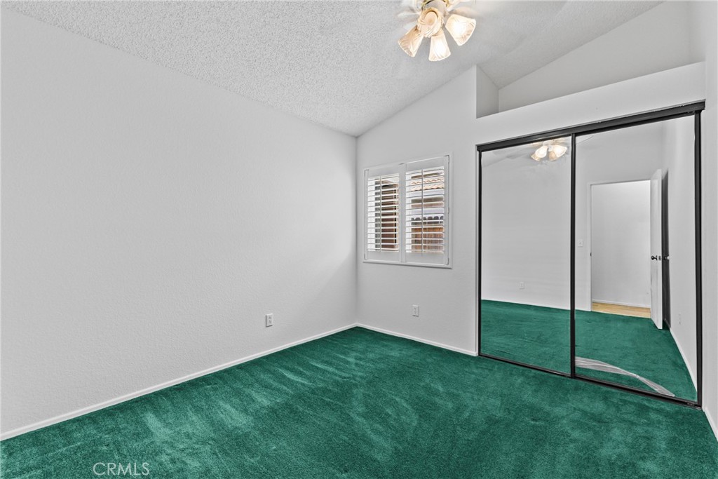 27126 Rio Vista Drive Menifee, CA 92586 - Photo 28 of 47 a view of an empty room with a window