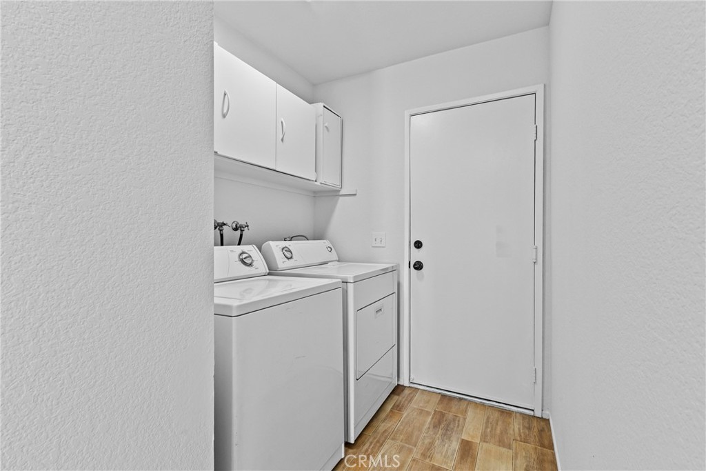 27126 Rio Vista Drive Menifee, CA 92586 - Photo 29 of 47 a utility room with dryer and washer