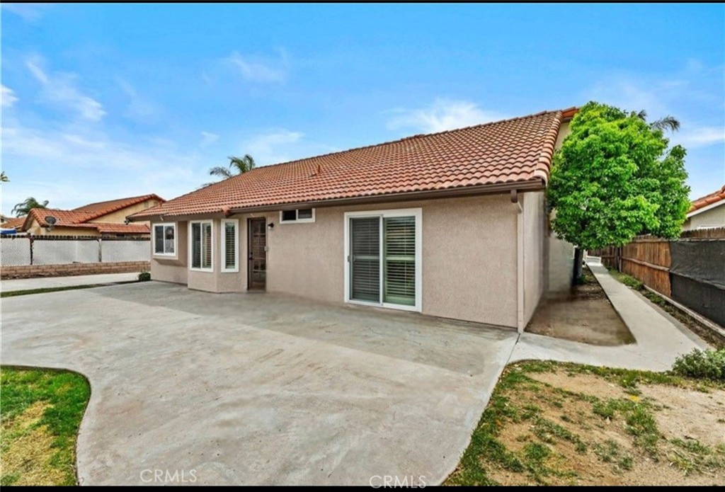 27126 Rio Vista Drive Menifee, CA 92586 - Photo 34 of 47 a front view of a house with a garden
