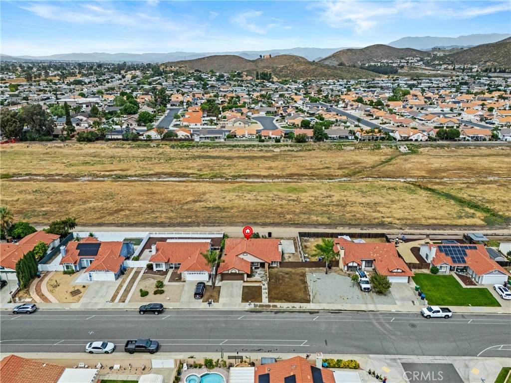 27126 Rio Vista Drive Menifee, CA 92586 - Photo 42 of 47 an aerial view of residential houses with outdoor space