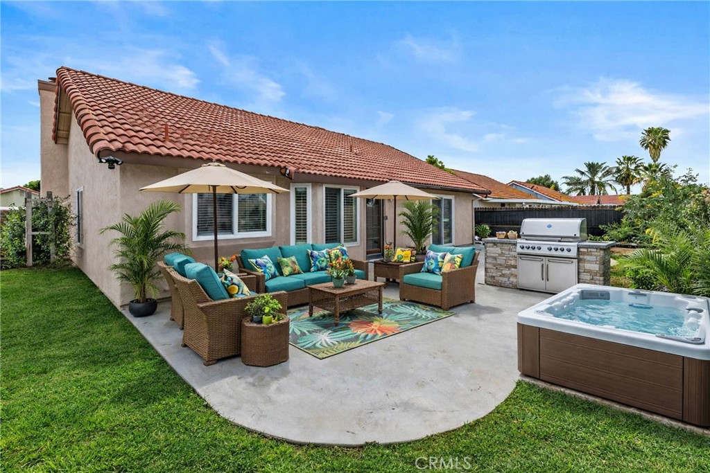 27126 Rio Vista Drive Menifee, CA 92586 - Photo 46 of 47 a view of a house with backyard porch and sitting area