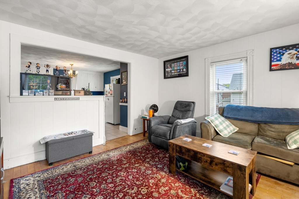 26 Powder Mill Road Maynard, MA 01754 - Photo 5 of 16 a living room with furniture and a couch