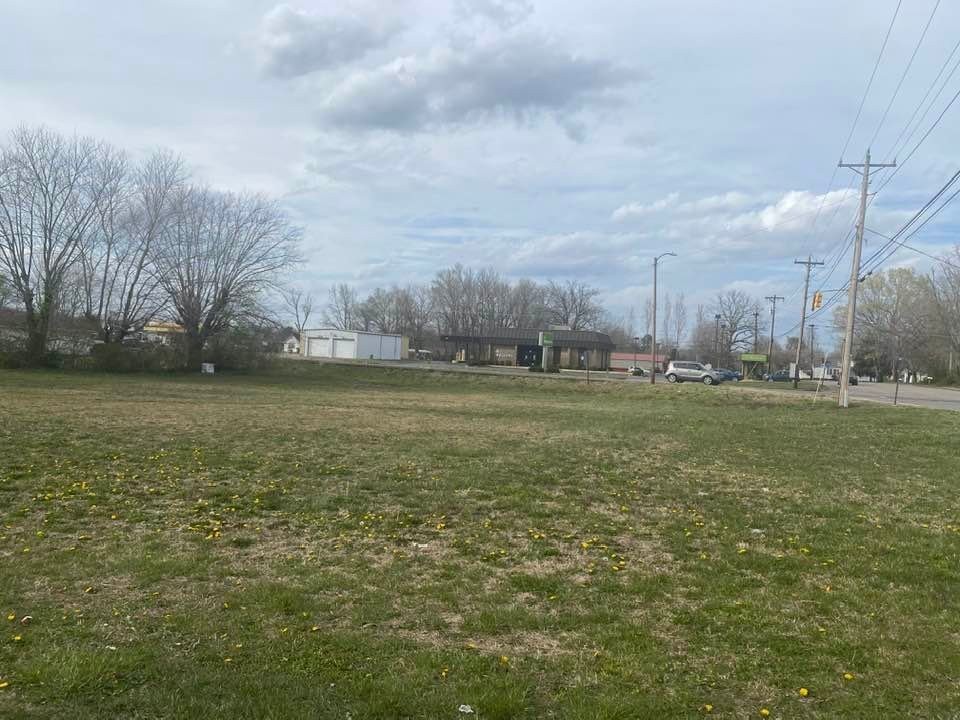 8 South Walnut Street Hohenwald, TN 38462 - Photo 4 of 7 a view of a field with an trees