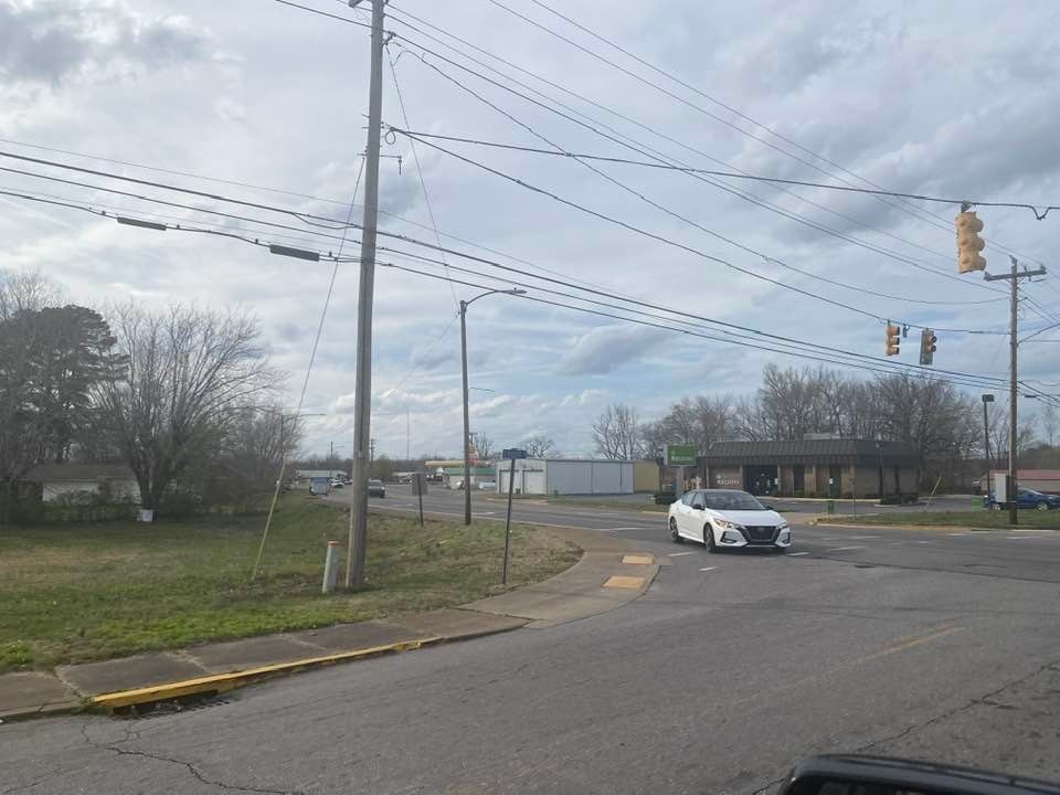 8 South Walnut Street Hohenwald, TN 38462 - Photo 5 of 7 a car parked on the side of the road