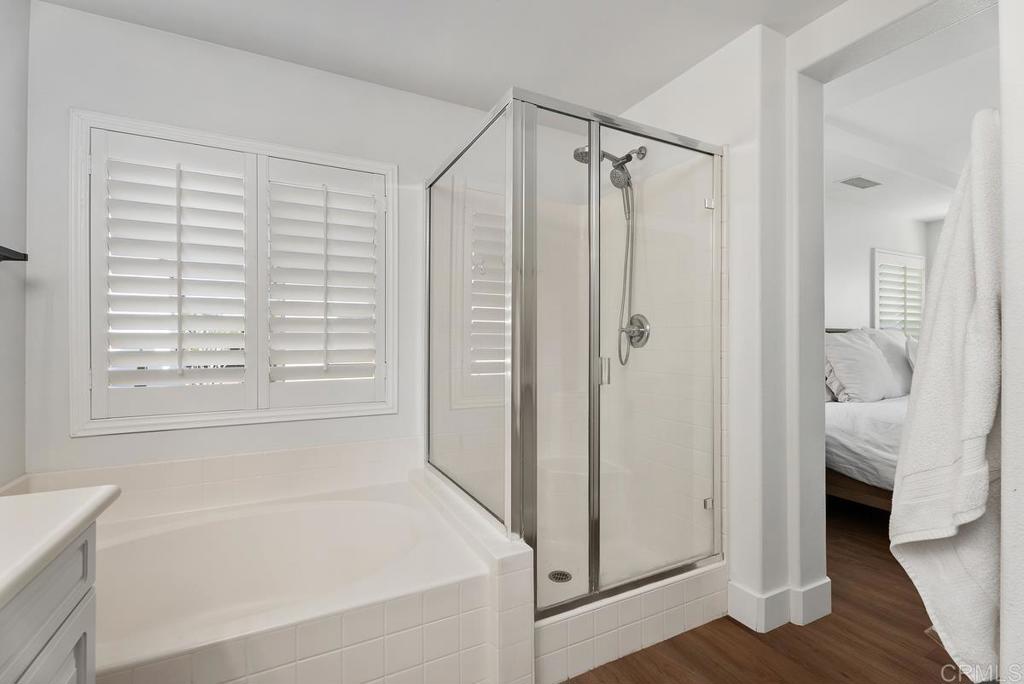 8 Potters Bend Ladera Ranch, CA 92694 - Photo 16 of 42 a bathroom with a bathtub and a shower