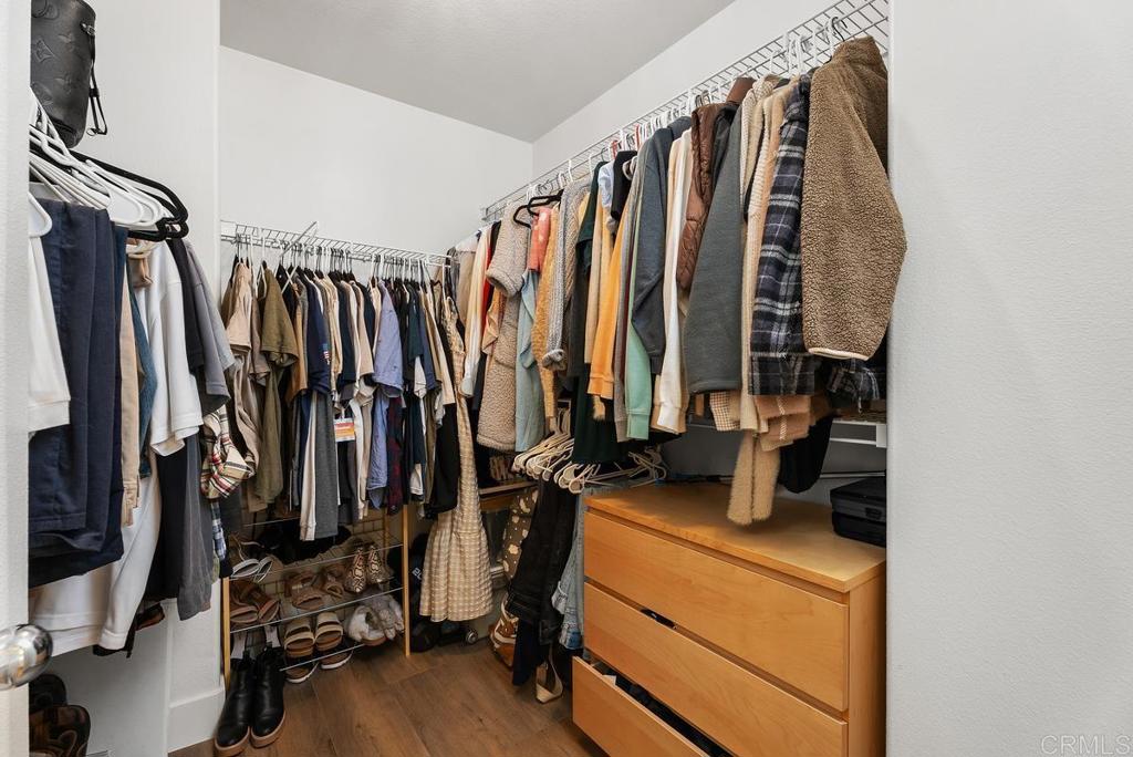 8 Potters Bend Ladera Ranch, CA 92694 - Photo 18 of 42 a view of walk in closet with clothes