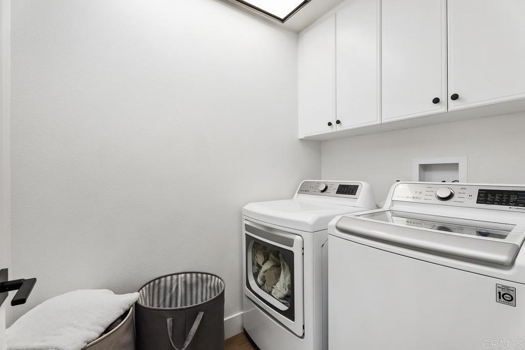8 Potters Bend Ladera Ranch, CA 92694 - Photo 20 of 42 a utility room with dryer and washer