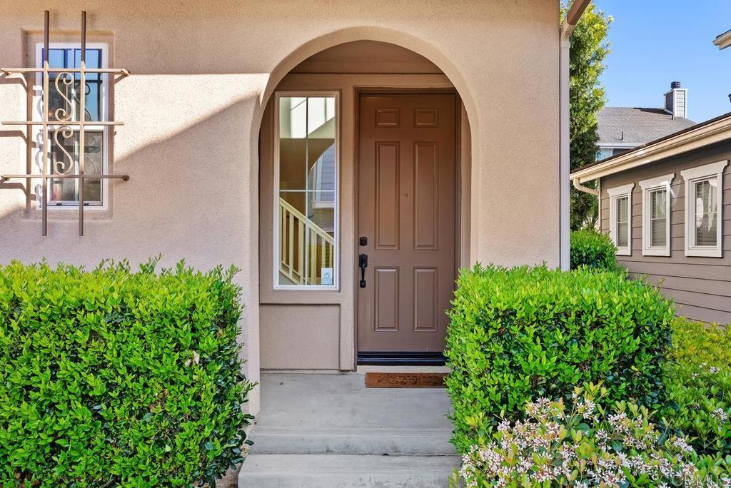 8 Potters Bend Ladera Ranch, CA 92694 - Photo 28 of 42 a front view of a house with garden