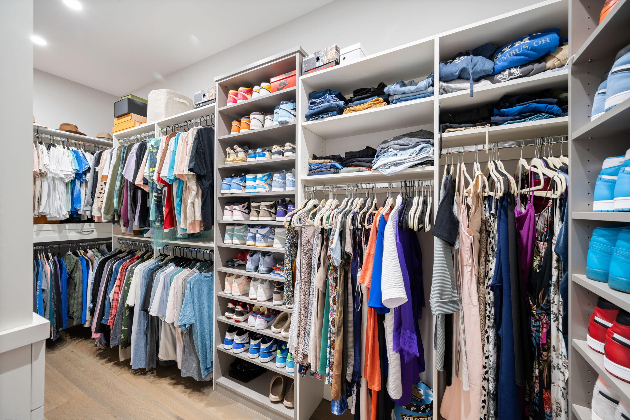 544 Live Oak Road Vero Beach, FL 32963 - Photo 26 of 55 a view of walk in closet with clothes and shoes