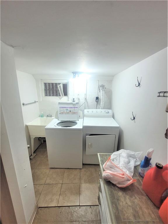 263 Robinson Street Pittsburgh, PA 15213 - Photo 16 of 21 a kitchen with a sink cabinets and wooden floor
