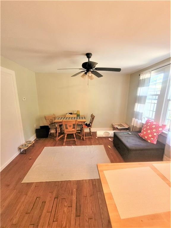 263 Robinson Street Pittsburgh, PA 15213 - Photo 4 of 21 a living room with furniture and a wooden floor