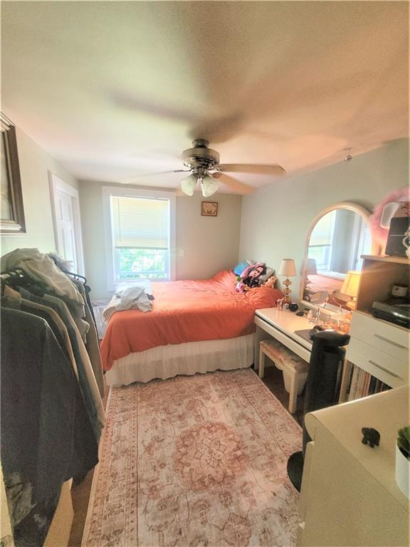 263 Robinson Street Pittsburgh, PA 15213 - Photo 9 of 21 a bedroom with a bed and a couch