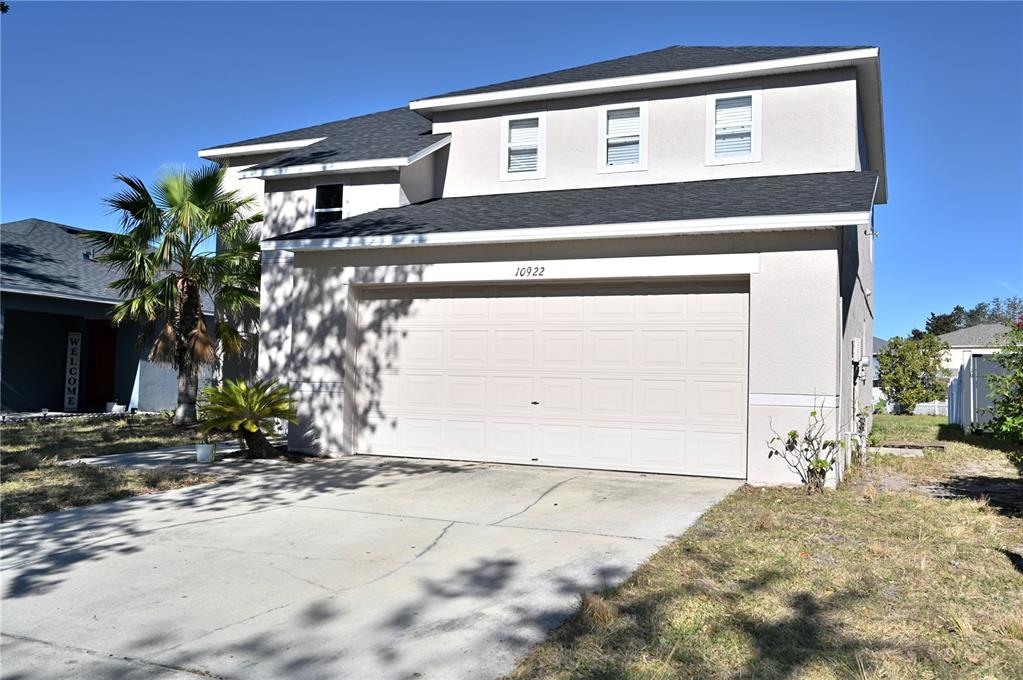 10922 Subtle Trail Drive Riverview, FL 33579 - Photo 50 of 60 a view of a house with a yard