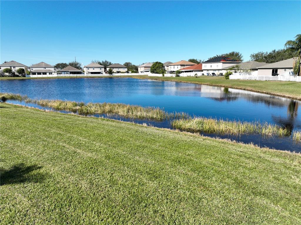 10922 Subtle Trail Drive Riverview, FL 33579 - Photo 59 of 60 a view of a lake with houses