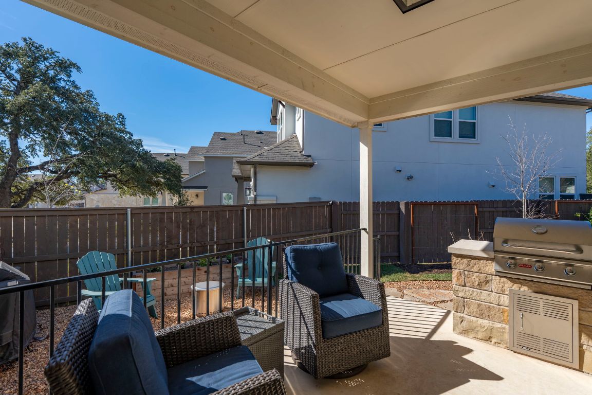 2605 Sam Bass Road, Unit 14 Round Rock, TX 78681 - Photo 26 of 30 a balcony with furniture and a potted plant