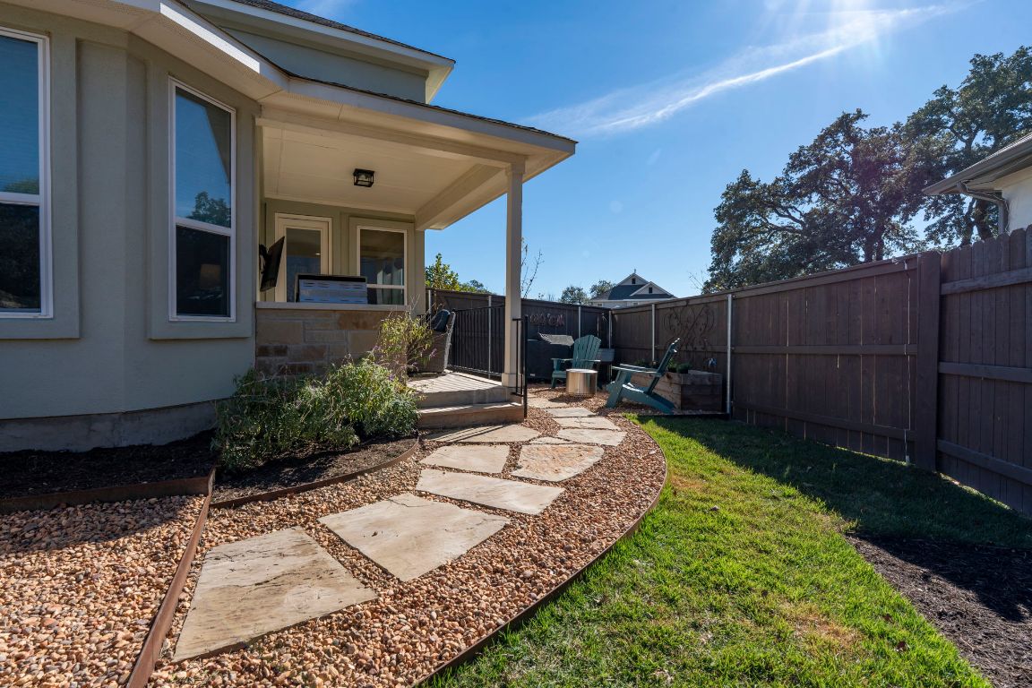 2605 Sam Bass Road, Unit 14 Round Rock, TX 78681 - Photo 29 of 30 a view of a backyard with sitting area