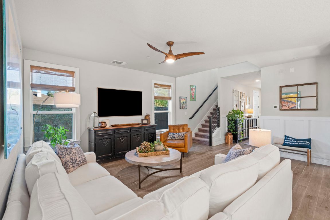 2605 Sam Bass Road, Unit 14 Round Rock, TX 78681 - Photo 7 of 30 a living room with furniture and a flat screen tv