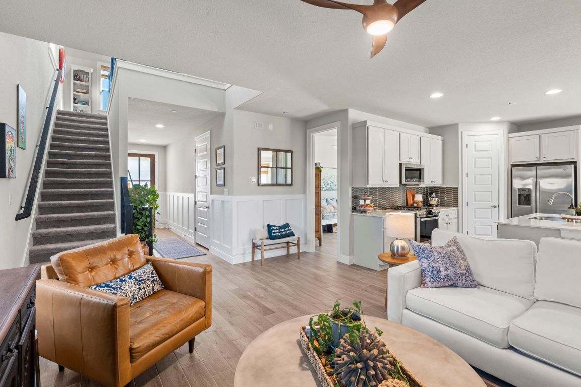 2605 Sam Bass Road, Unit 14 Round Rock, TX 78681 - Photo 9 of 30 a living room with furniture and wooden floor