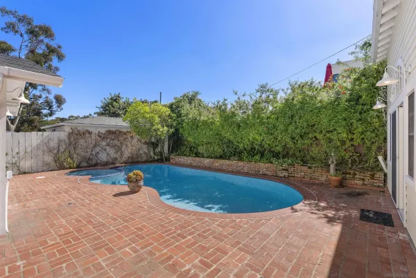 a view of a outdoor space with a swimming pool