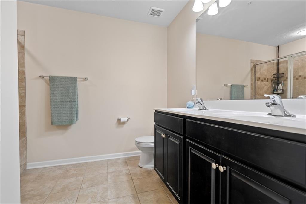 2284 Flint Drive Washington, PA 15301 - Photo 15 of 28 a bathroom with a sink and a mirror