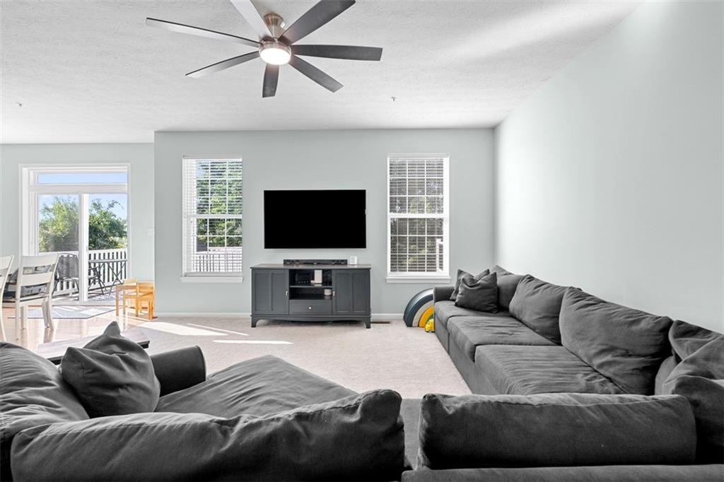 2284 Flint Drive Washington, PA 15301 - Photo 4 of 28 a living room with furniture and a flat screen tv