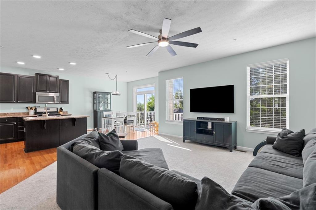 2284 Flint Drive Washington, PA 15301 - Photo 5 of 28 a living room with furniture and a flat screen tv