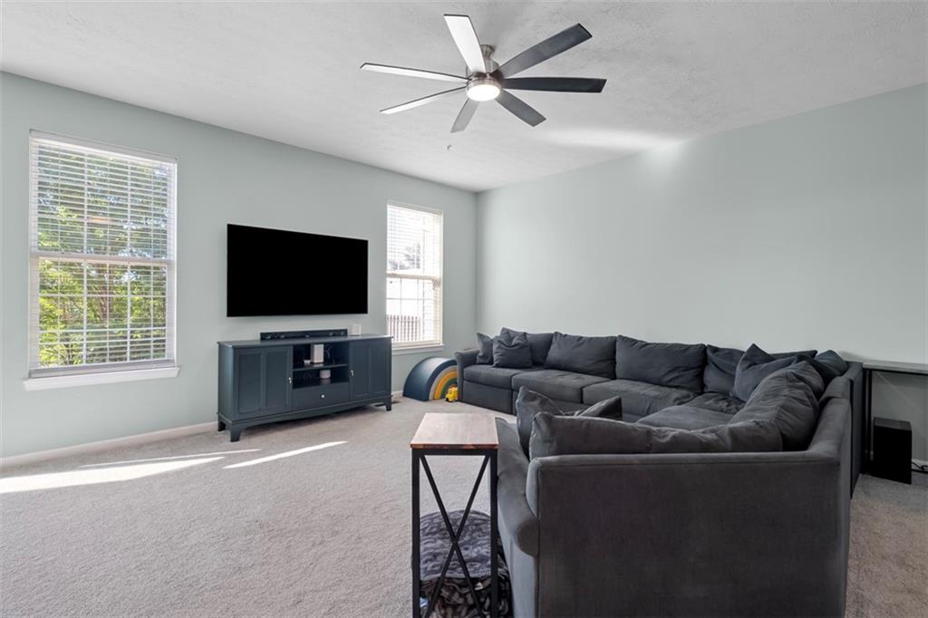 2284 Flint Drive Washington, PA 15301 - Photo 6 of 28 a living room with furniture and a flat screen tv