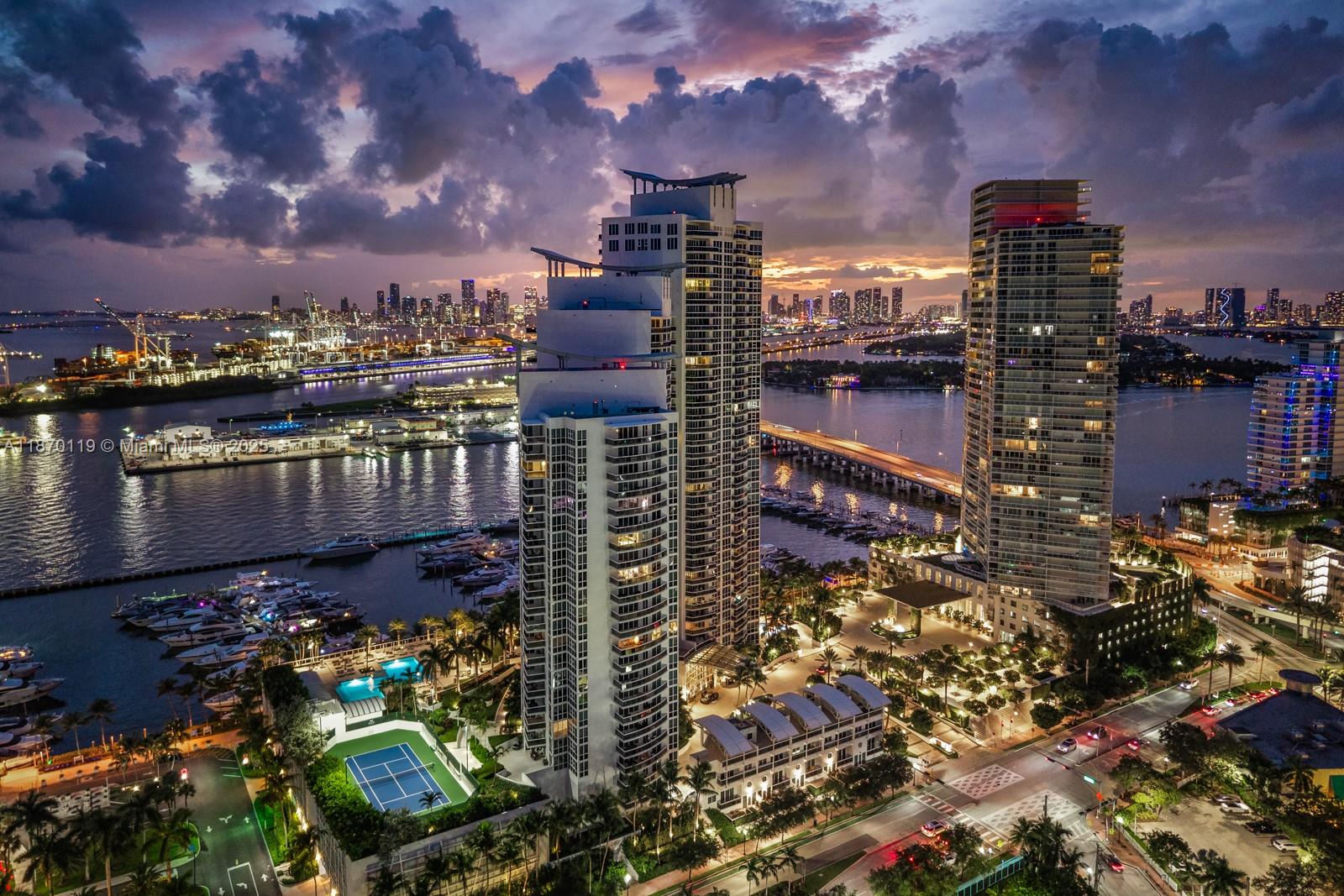 400 Alton Road, Unit TH1A Miami Beach, FL 33139 - Photo 1 of 45 a view of a city with tall buildings
