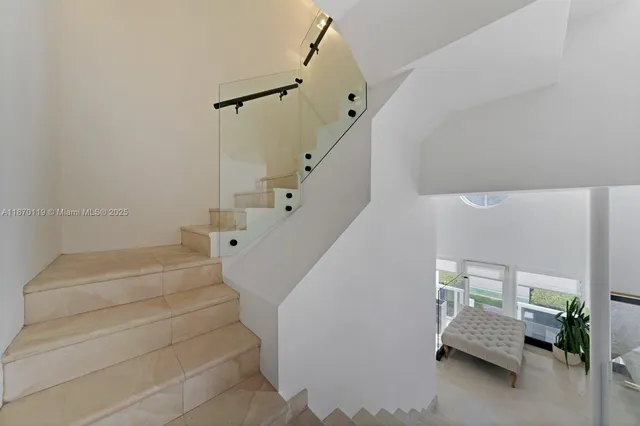 a bed room with a bed and a window