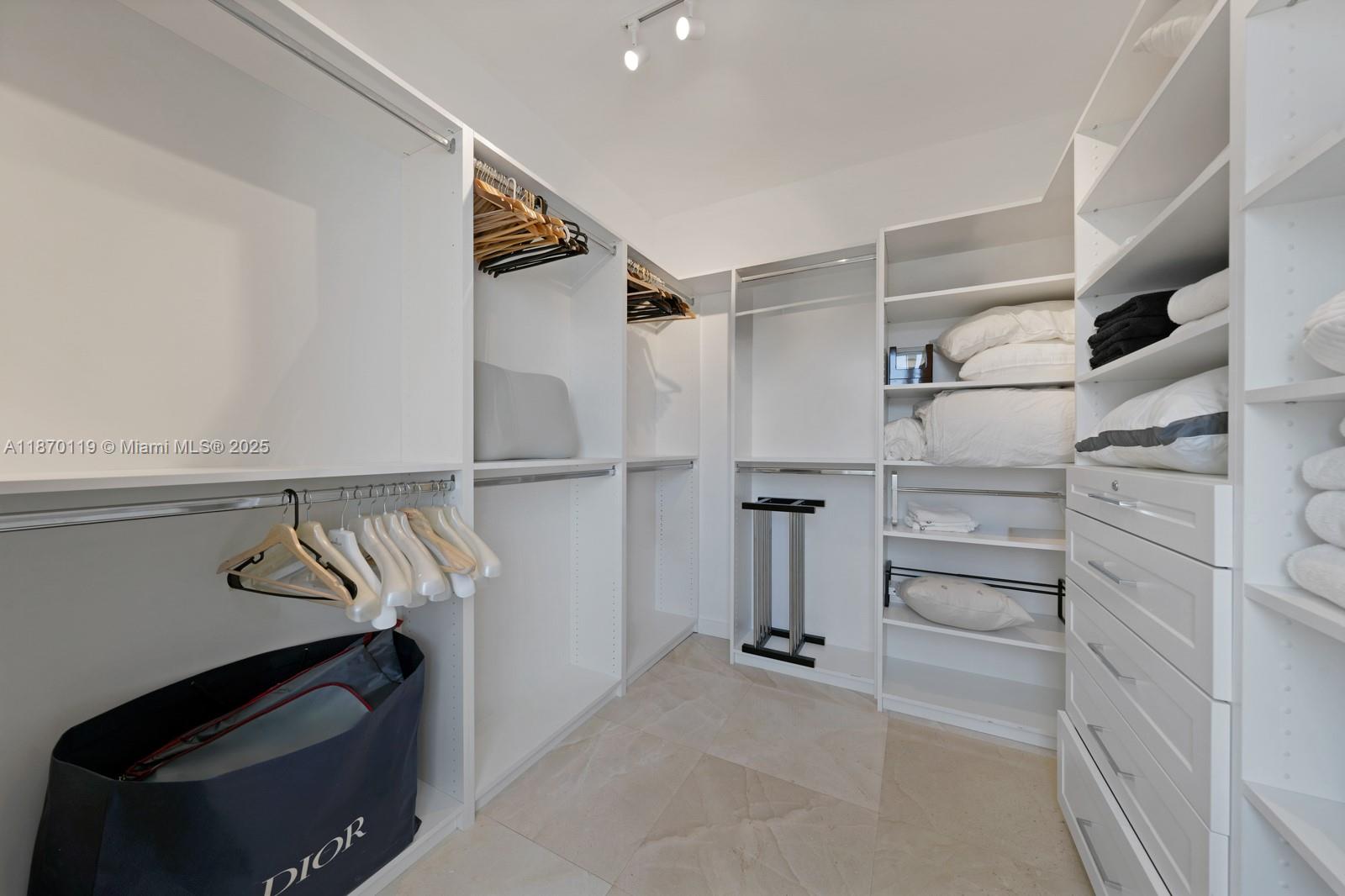 400 Alton Road, Unit TH1A Miami Beach, FL 33139 - Photo 20 of 45 a view of walk in closet