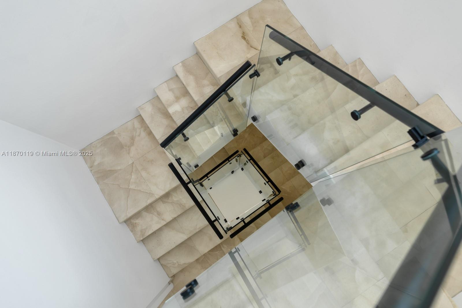 400 Alton Road, Unit TH1A Miami Beach, FL 33139 - Photo 28 of 45 view of a staircase