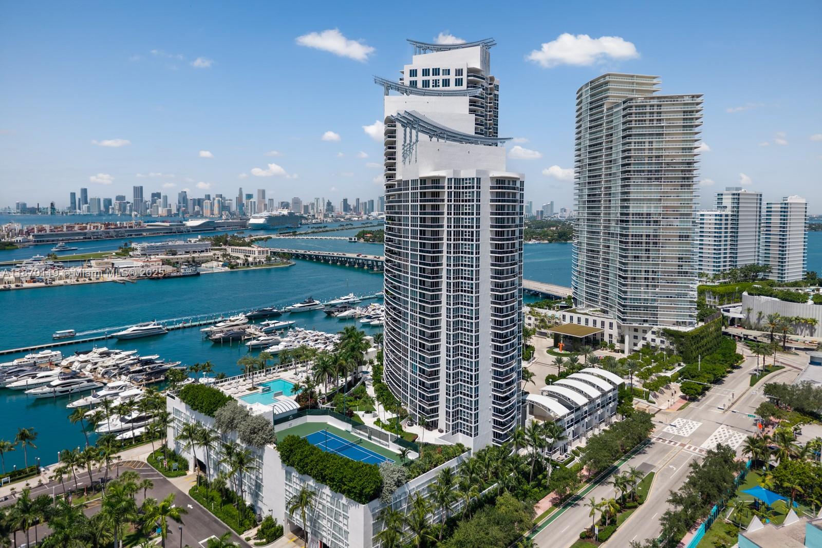 400 Alton Road, Unit TH1A Miami Beach, FL 33139 - Photo 38 of 45 a city view with tall buildings