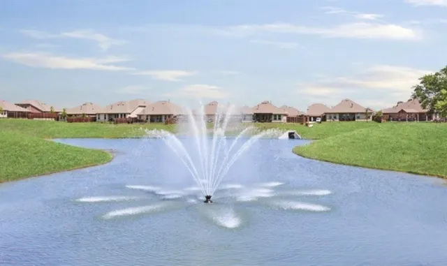 a view of a lake with a city view