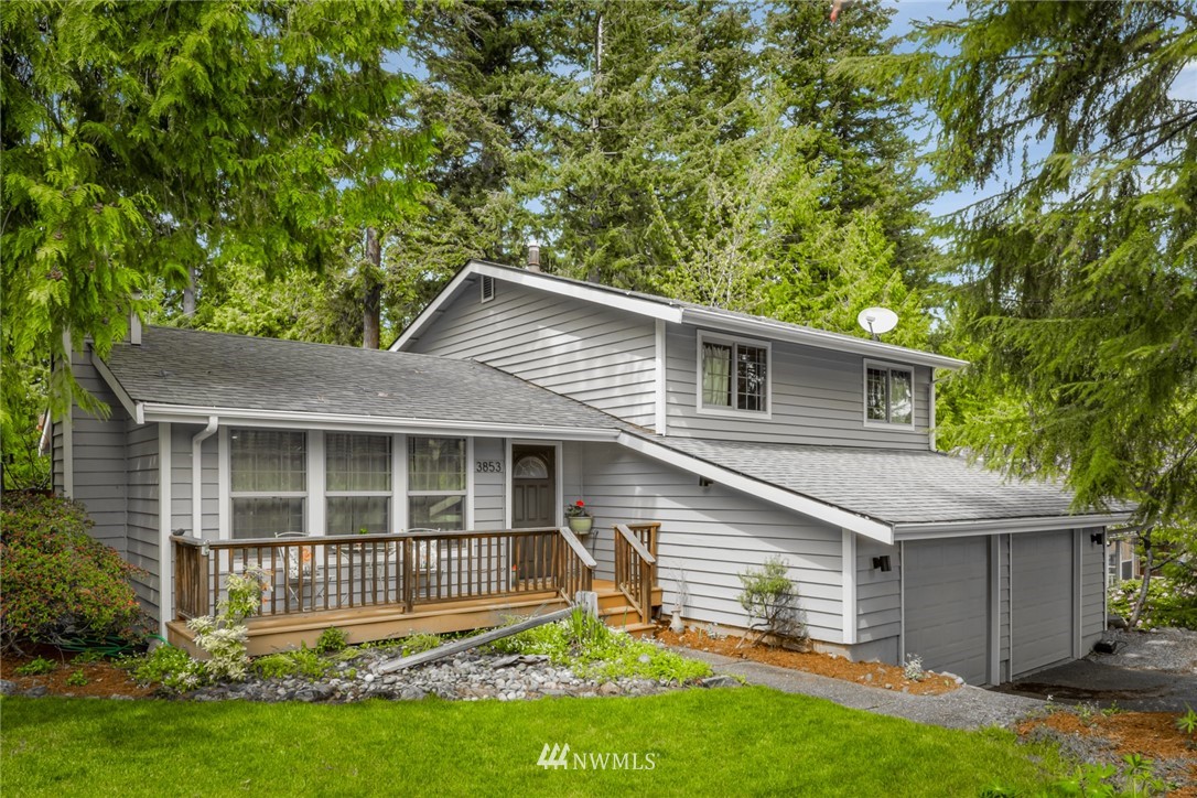 3853 Magrath Road Bellingham, WA 98226 - Photo 1 of 40 a front view of a house with a garden