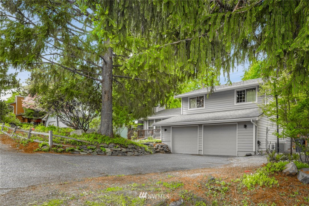 3853 Magrath Road Bellingham, WA 98226 - Photo 2 of 40 a front view of a house with a garden