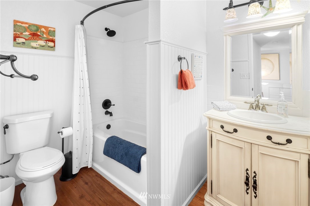 3853 Magrath Road Bellingham, WA 98226 - Photo 24 of 40 a bathroom with a sink a toilet and shower