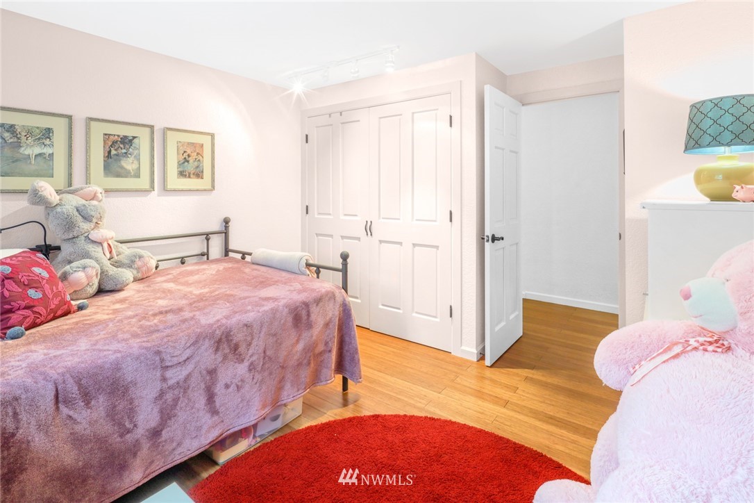 3853 Magrath Road Bellingham, WA 98226 - Photo 25 of 40 a bedroom with a bed and a table in it