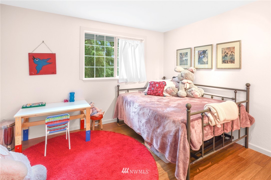 3853 Magrath Road Bellingham, WA 98226 - Photo 26 of 40 a bedroom with a bed and a window