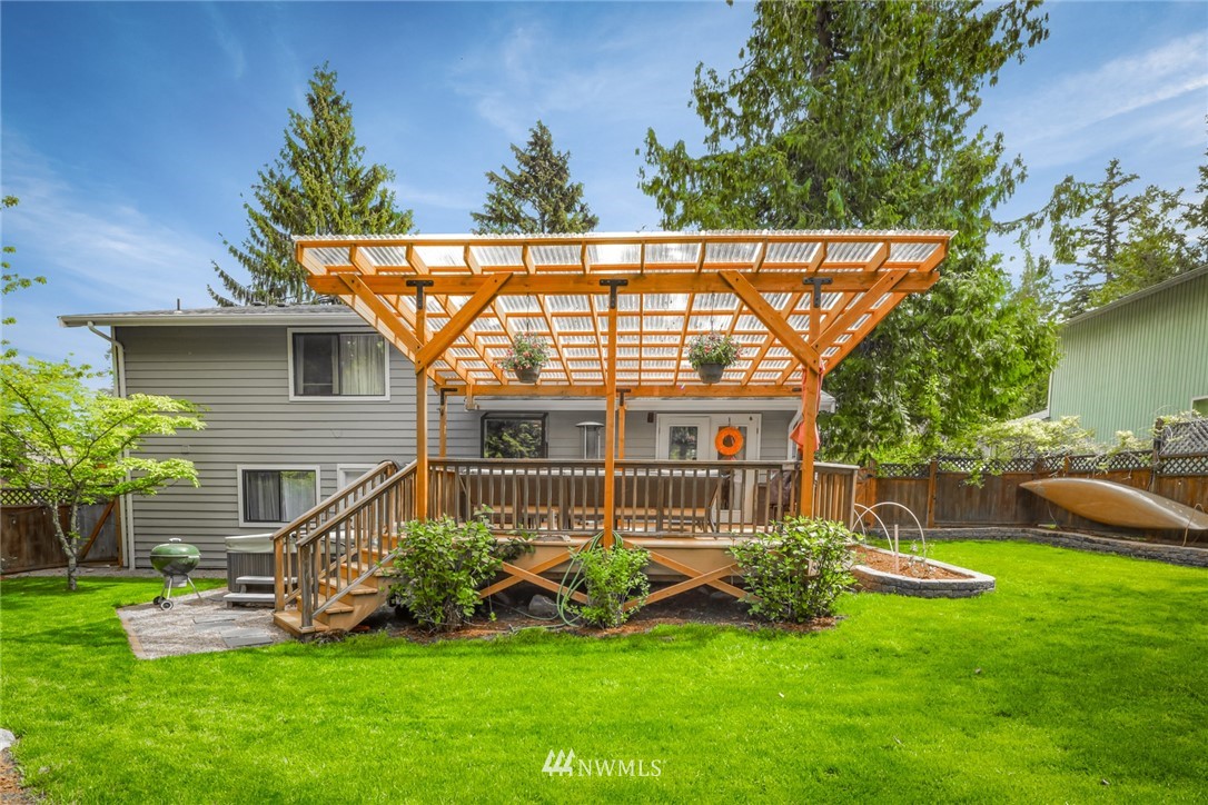 3853 Magrath Road Bellingham, WA 98226 - Photo 37 of 40 a view of a house with a yard and sitting area