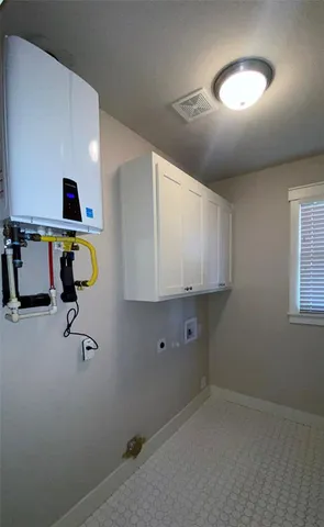 a room with painting and wooden floor