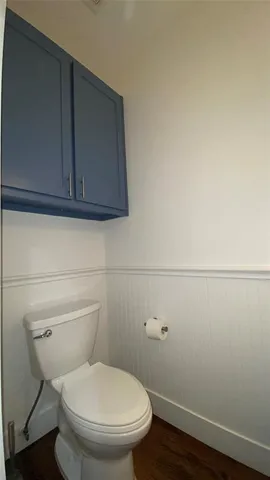 a bathroom with a toilet