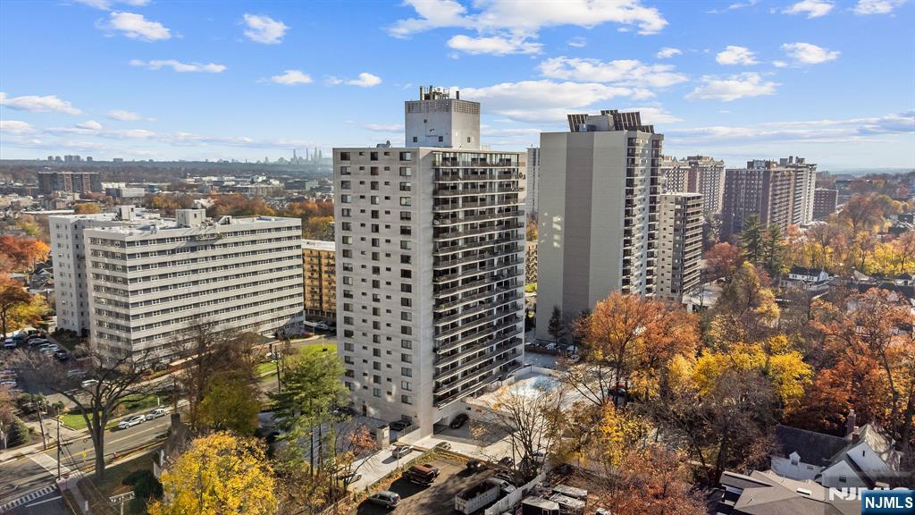 277 Prospect Avenue, Unit 11H Hackensack, NJ 07601 - Photo 1 of 23 a view of a city with tall buildings