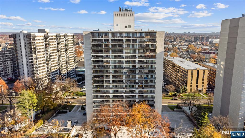277 Prospect Avenue, Unit 11H Hackensack, NJ 07601 - Photo 2 of 23 a view of a city with tall buildings