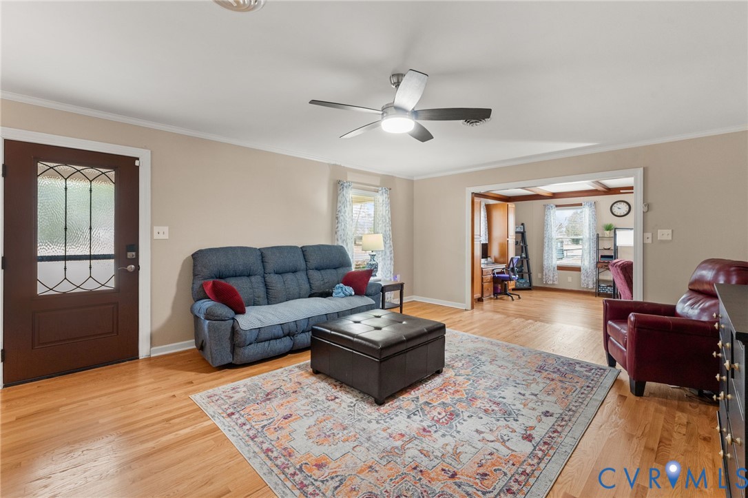 8674 Mary Ball Road Lancaster, VA 22503 - Photo 21 of 38 a living room with furniture and a rug